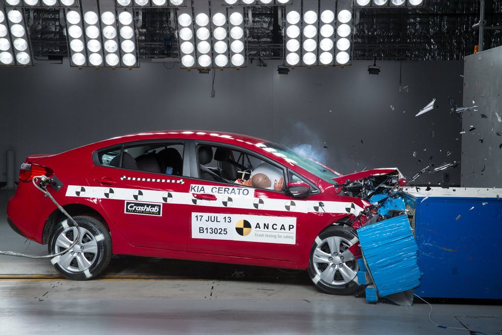 Frontal offset test at 64km/h.  This ANCAP safety rating is based on ANCAP tests of the Kia Cerato conducted in 2013.
